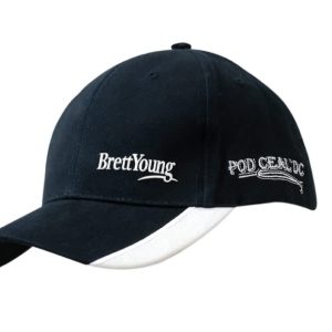 A navy brushed heavy cotton cap featuring peak indents and white embroidery, with a logo.