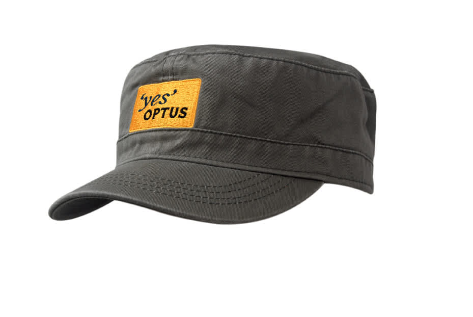 A washed chino twill military cap in olive green with a branded patch on the front.