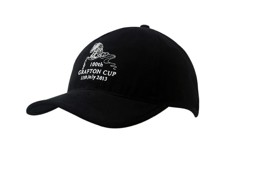 A black cap with a peak, featuring a logo and embroidered text on the front.