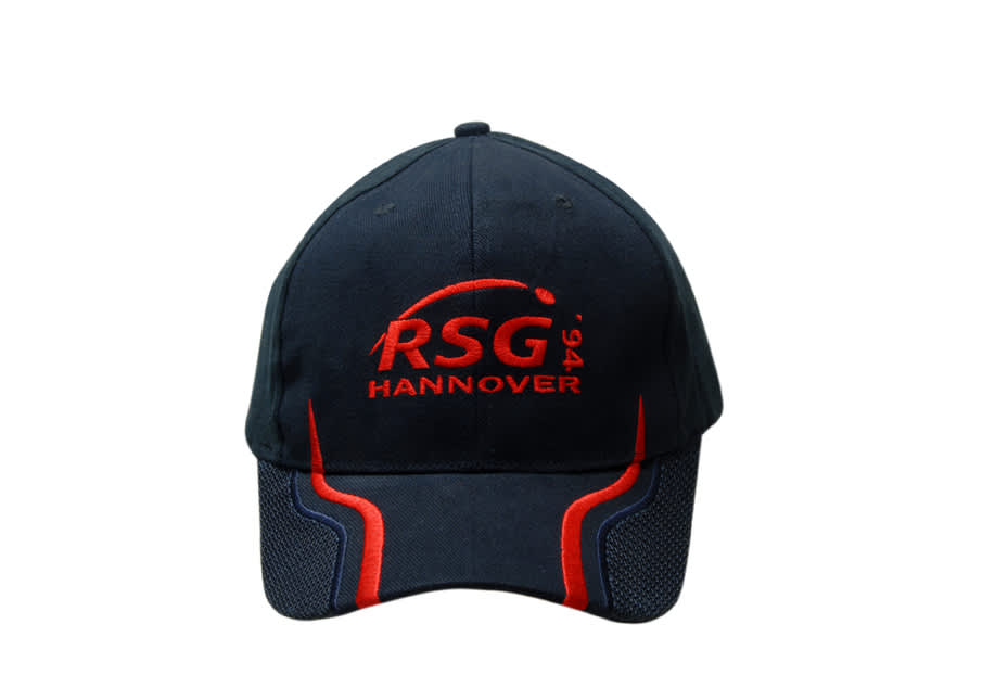 A navy cap featuring peak mesh inserts and embroidered branding in red, with contrasting accents.