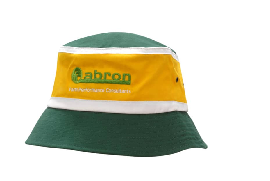 A green and yellow premium cotton twill bucket hat with crown trims and a branding logo.