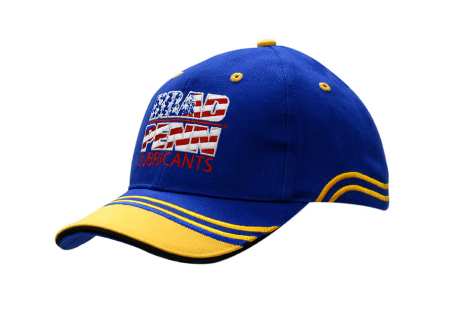 A blue cap with yellow sandwich trim, peak indent, crown embroidery, and a logo on the front.