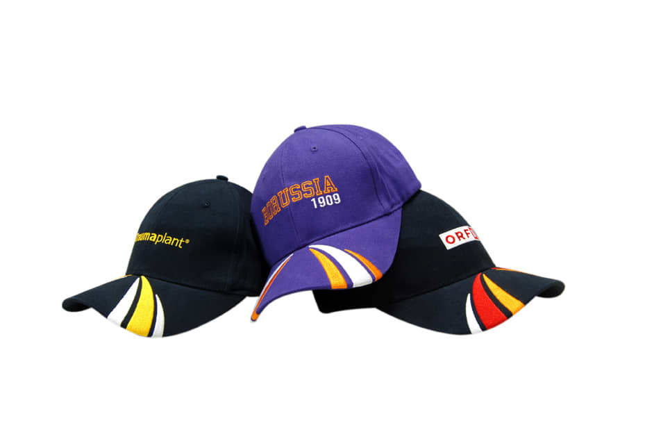 Three caps displayed: a black cap, a purple cap with embroidered text, and a black cap with colourful accents. Each has a logo.