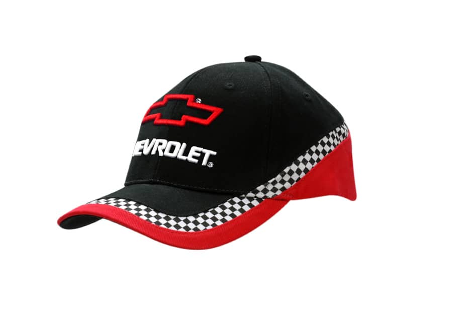 A black cap with a check print, featuring a red brim and logo on the front.