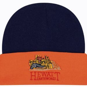 A navy and orange beanie featuring an illustration of construction equipment and a logo on the front.