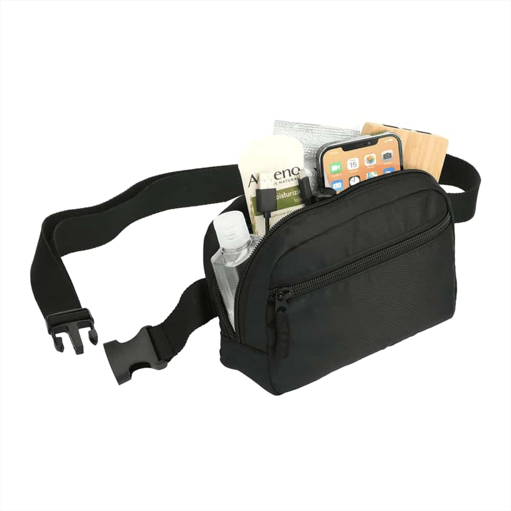 A black fanny pack features a rainbow strap, holding a phone, a notebook, and a small tube.