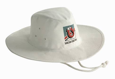 A white Poly Cotton Slouch Hat featuring a logo on the front and a chin strap for added security.