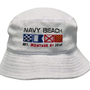 A white terry towelling bucket hat featuring an embroidered logo with nautical flags and text.