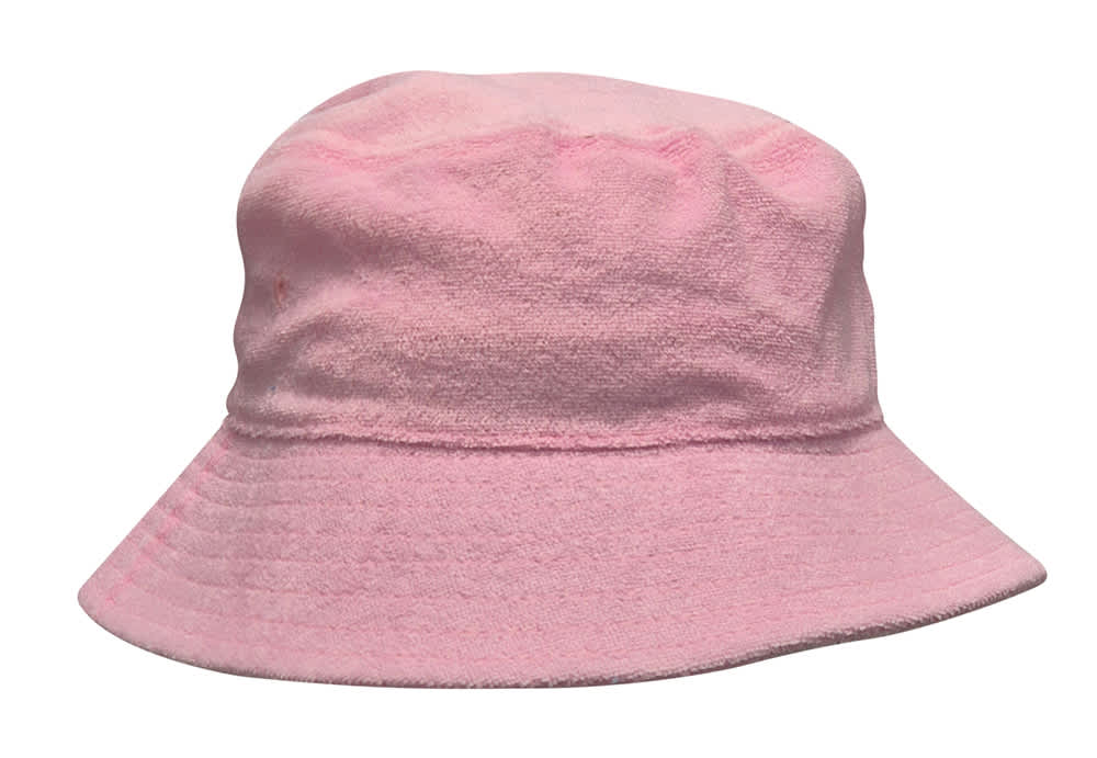 A pink terry towelling bucket hat with a soft texture and a wide brim. It features a simple design and has a logo.