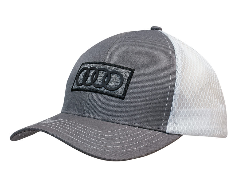 A grey cap with a honeycomb mesh back and a logo on the front.