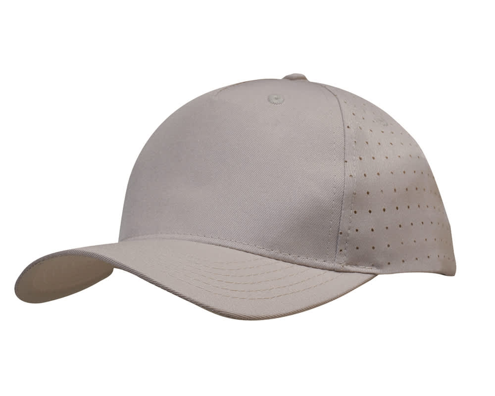 A beige cap with circle perforations on the side and a curved brim, featuring a logo.