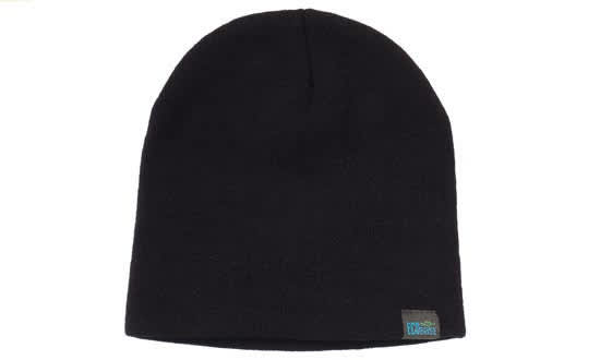A black beanie with a logo tag, featuring a roll-down style, made from recycled materials.