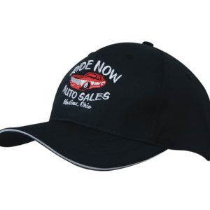 A black cap with a sandwich brim, featuring an embroidered logo on the front.