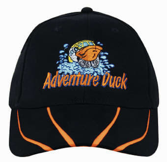 A black cap with a two-tone orange peak, featuring an embroidered design and logo on the front.