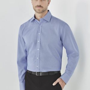 A long-sleeve button-up shirt in light blue, featuring a standard collar and a fitted design, worn with black trousers.