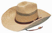 A large, light brown cowboy straw hat with a woven texture and a brown band around the base.