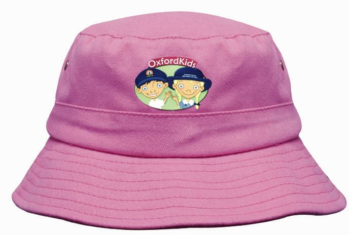 A pink infants bucket hat featuring a logo and playful graphics, designed for sun protection.