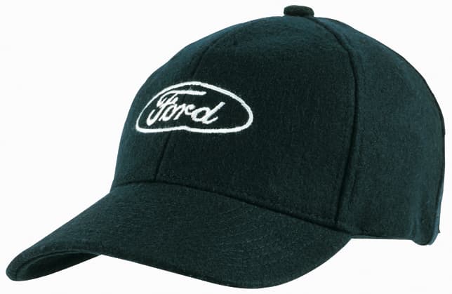 A green Melton wool cap featuring an embroidered logo on the front. The cap has a classic baseball style.