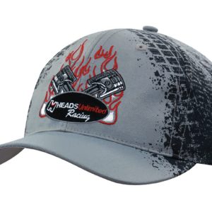 A grey cap featuring a tyre print design and pistons with flames, complete with a branding logo.