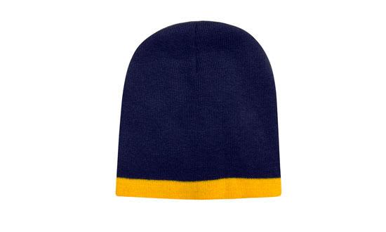 A two-tone acrylic beanie in navy blue with a yellow rolled brim, featuring a logo.