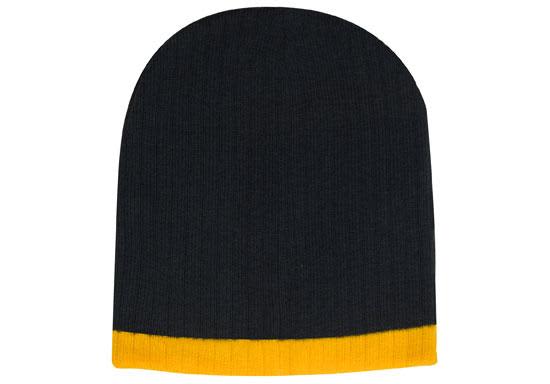 A two-tone cable knit beanie in dark green and yellow with a smooth finish and a branded logo.