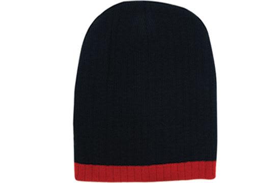 A two-tone cable knit beanie in black with a red brim. It features a logo on the side.