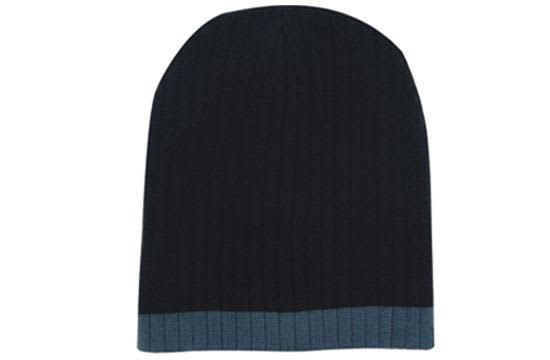 A two-tone cable knit beanie in black and grey with a ribbed design and logo.
