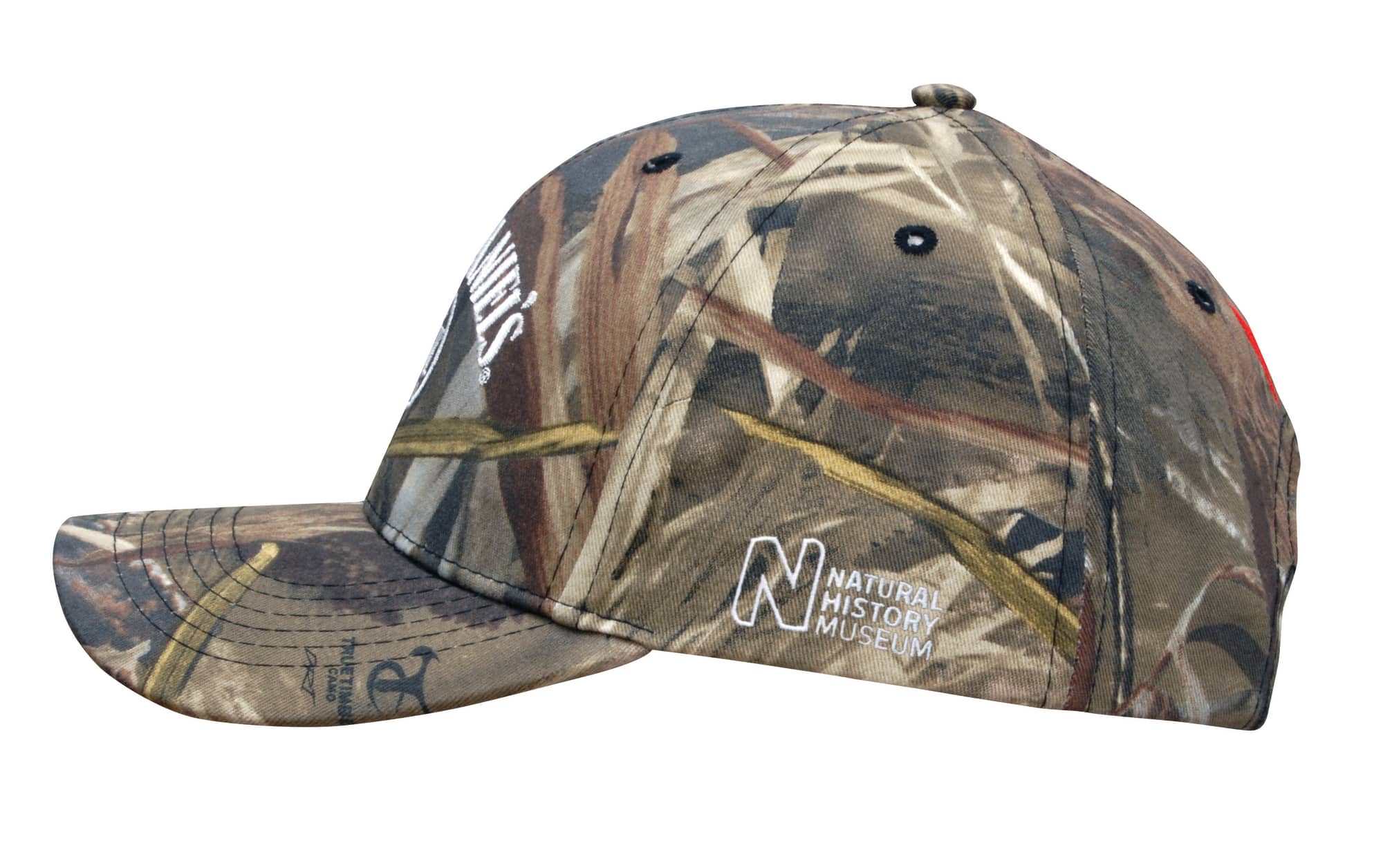 A camouflage 6 panel cap featuring various earthy tones and a logo on the side.