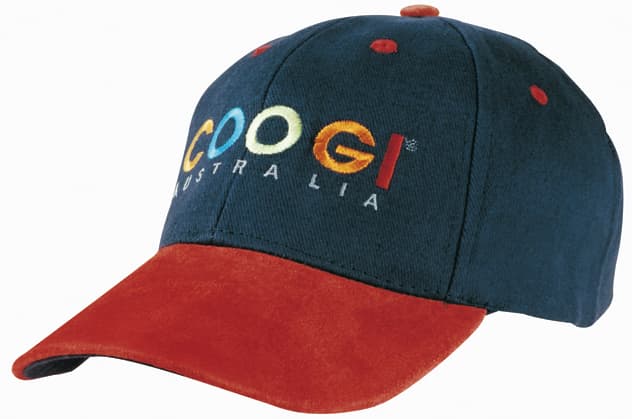 A navy cap with a suede peak in rust, featuring a logo on the front.