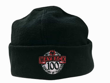 A black micro fleece beanie with a logo featuring the text 