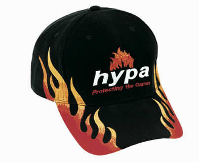 A black cap with double flame designs in red and yellow, featuring a logo on the front.