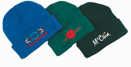 Three acrylic beanies in blue, green, and dark green, featuring various logos on the front.