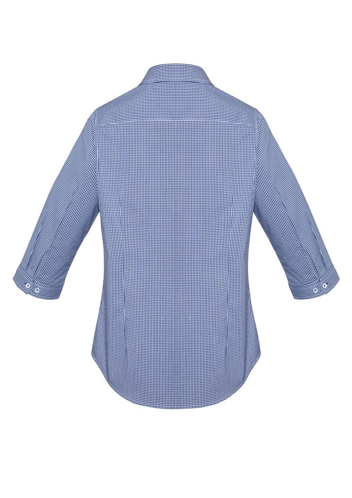 A women's button-up shirt in blue and white check pattern with 3/4 sleeves and a back yoke. Features a logo.