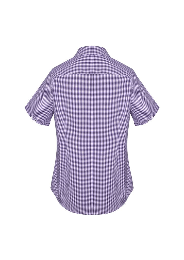 A short-sleeve women's button-up shirt in a purple check pattern, featuring a collar and a back yoke.
