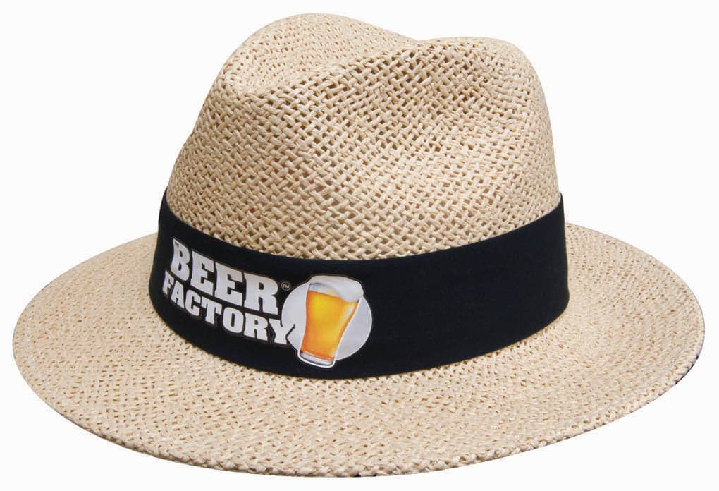 A natural straw hat with a black band and a logo. The hat has a wide brim and a classic style.