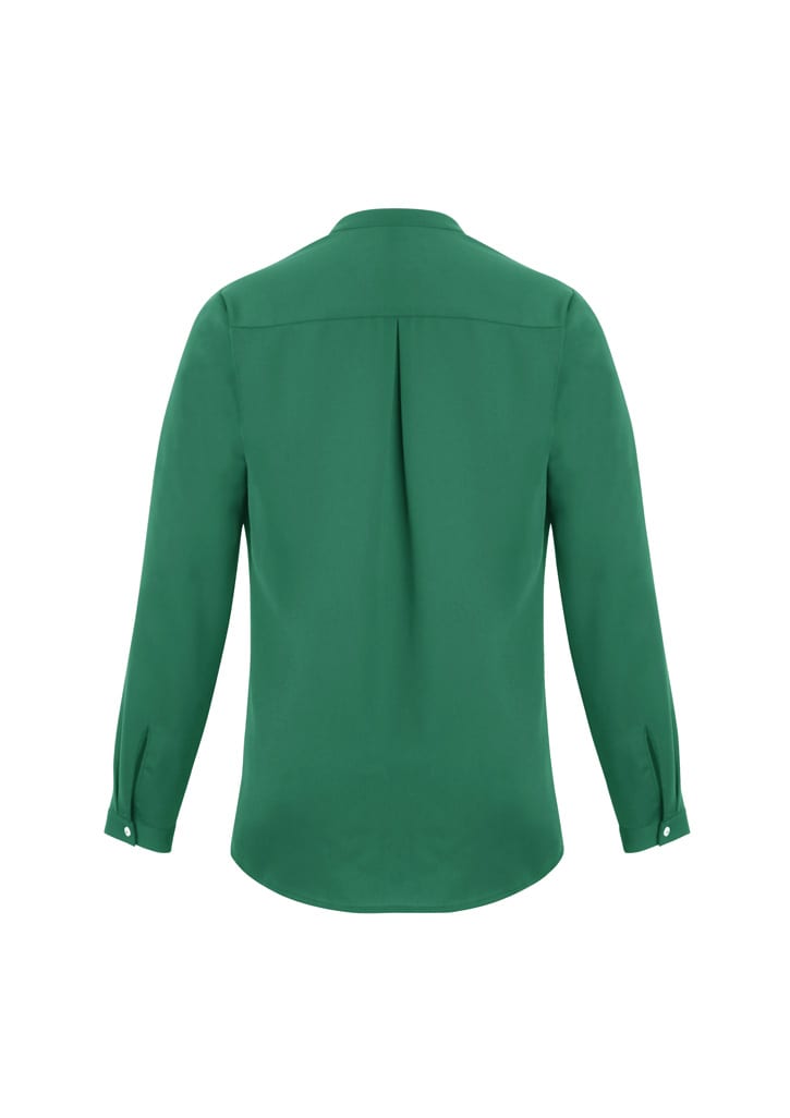 A green long sleeve blouse with a button-up neckline and a pleat detail at the back. Features a logo on the fabric.