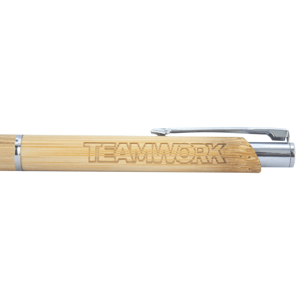 A bamboo ballpoint pen with a silver clip and engraved 