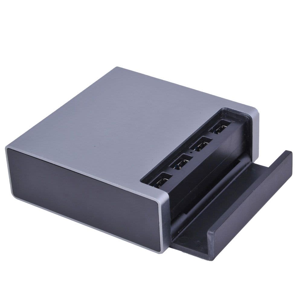 A USB smart charger in silver and black, featuring multiple USB ports for charging devices.