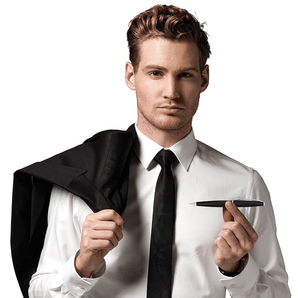 A metal twist action pen held by a man in formal attire, with a black suit jacket draped over one shoulder.