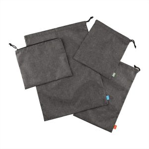 A set of four grey recycled clean bags featuring drawstring closures and a variety of sizes.