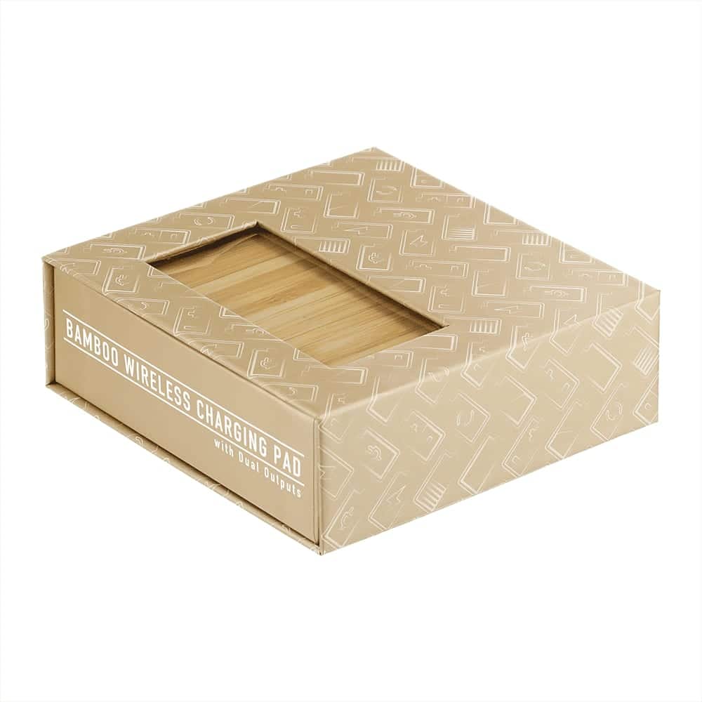 A bamboo wireless charging pad in a decorative box, featuring dual outputs and a logo.