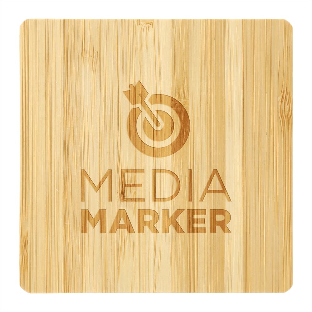 A bamboo wireless charging pad with a square shape and a logo engraving. The surface has a natural wood finish.