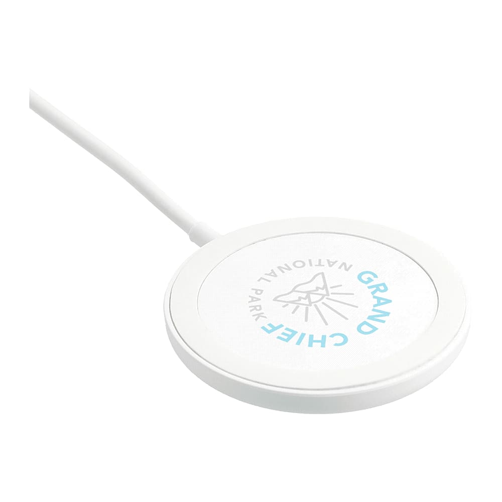 A white wireless charging pad with a circular design and a logo in the centre.