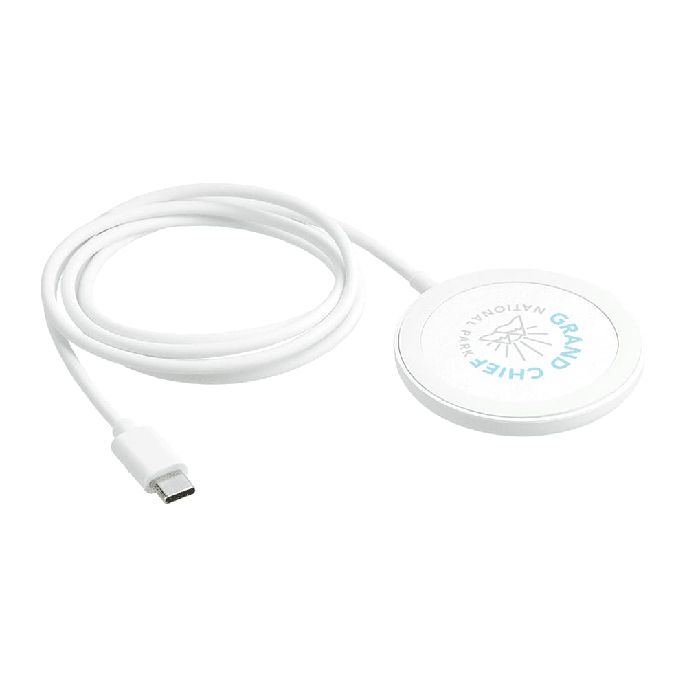 A white wireless charging pad with a connecting cable. It features a logo on the surface.
