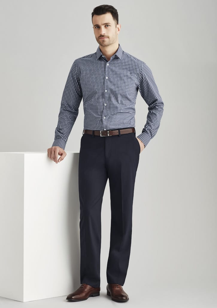 Men's comfortable wool stretch flat front pants in navy, paired with a checkered shirt and brown belt, featuring a logo.