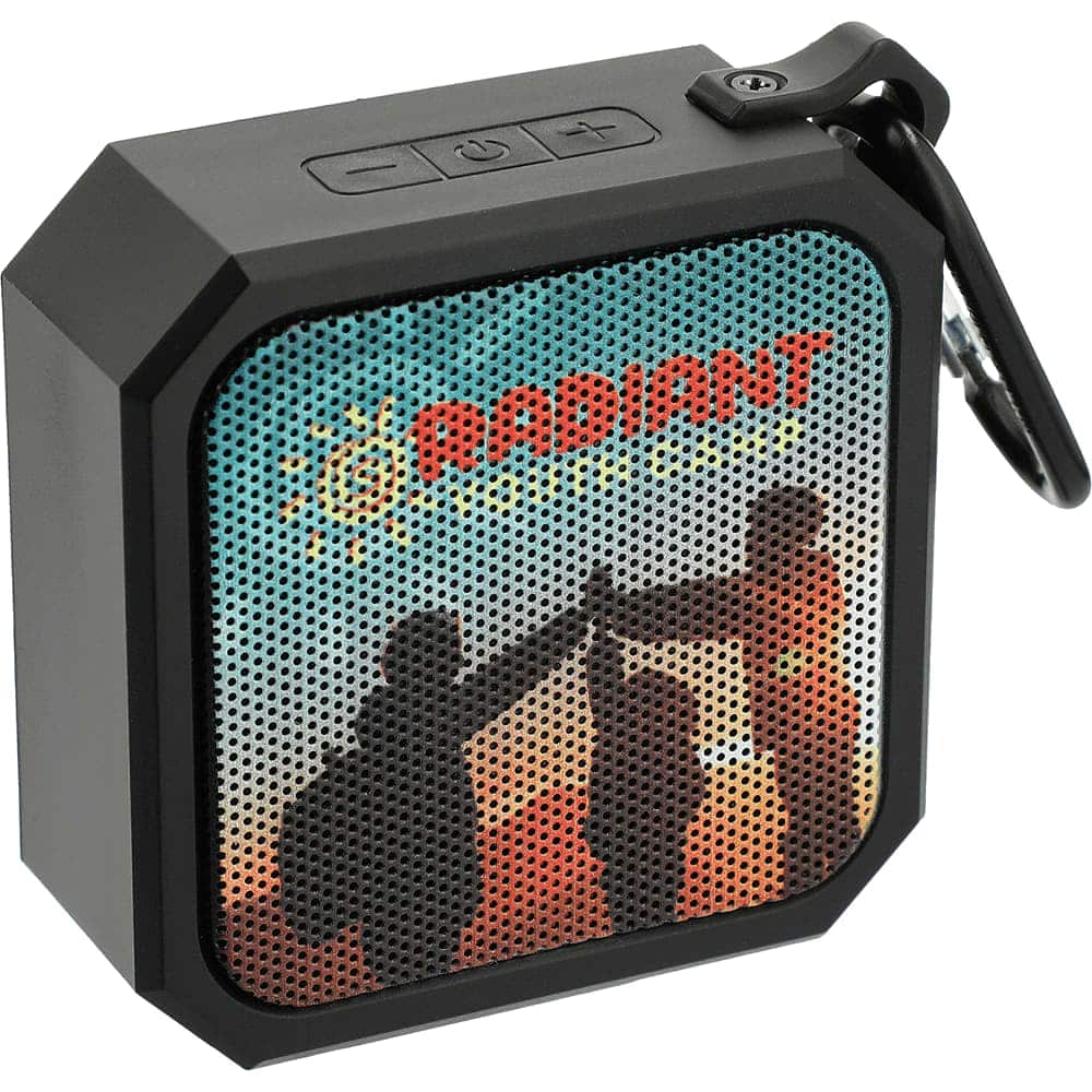 A waterproof Bluetooth speaker in black, featuring an intricate patterned front design. It has a small branding logo.