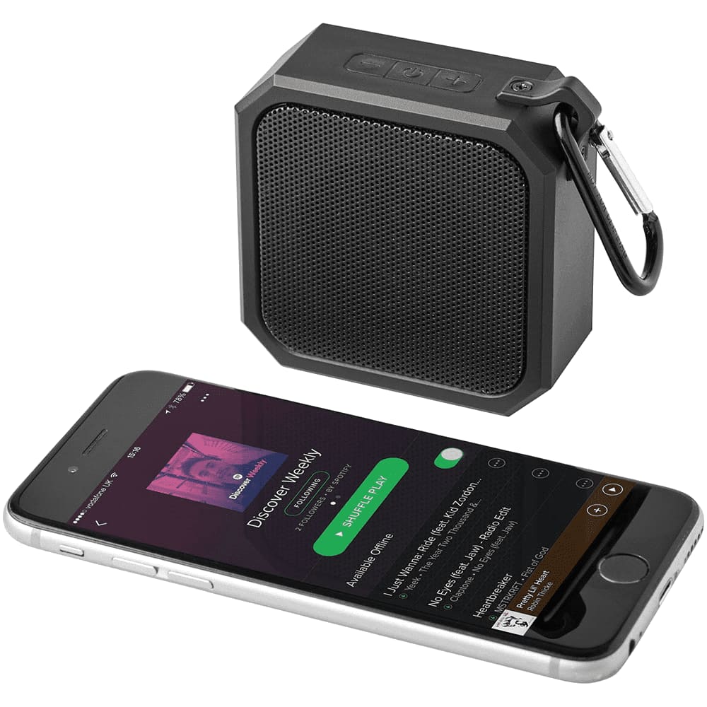 A black waterproof Bluetooth speaker with a carabiner clip and a rubberised back. It features a charging port.
