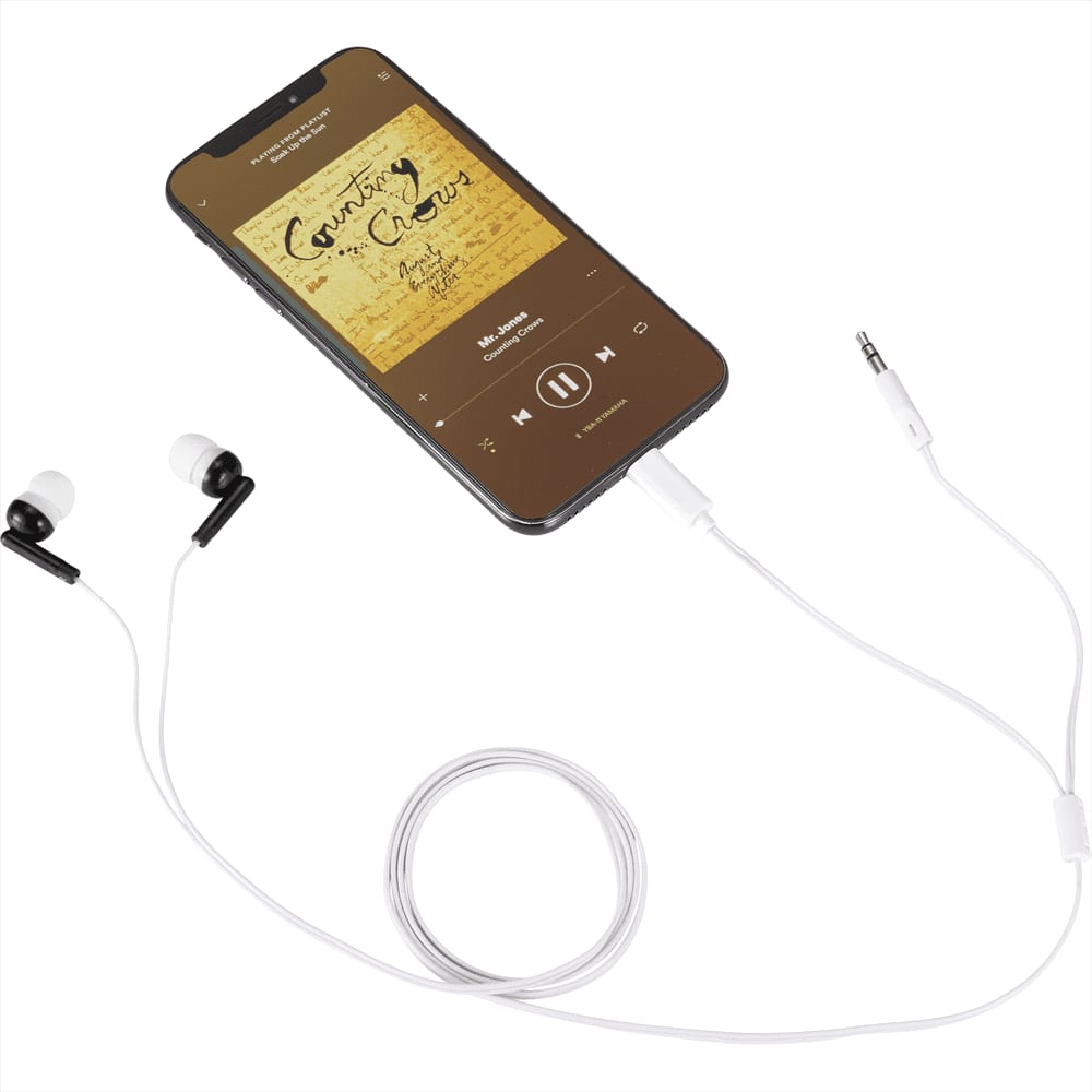 Wired earbuds with black tips connected to a white audio cable, laid beside a smartphone displaying music playback.