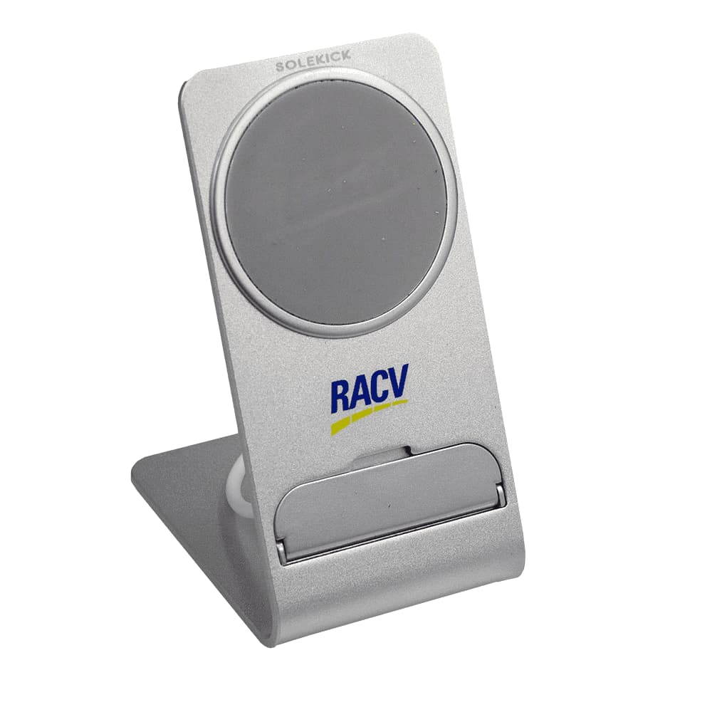 A silver wireless charging stand with a circular charging pad, featuring a logo on the front.