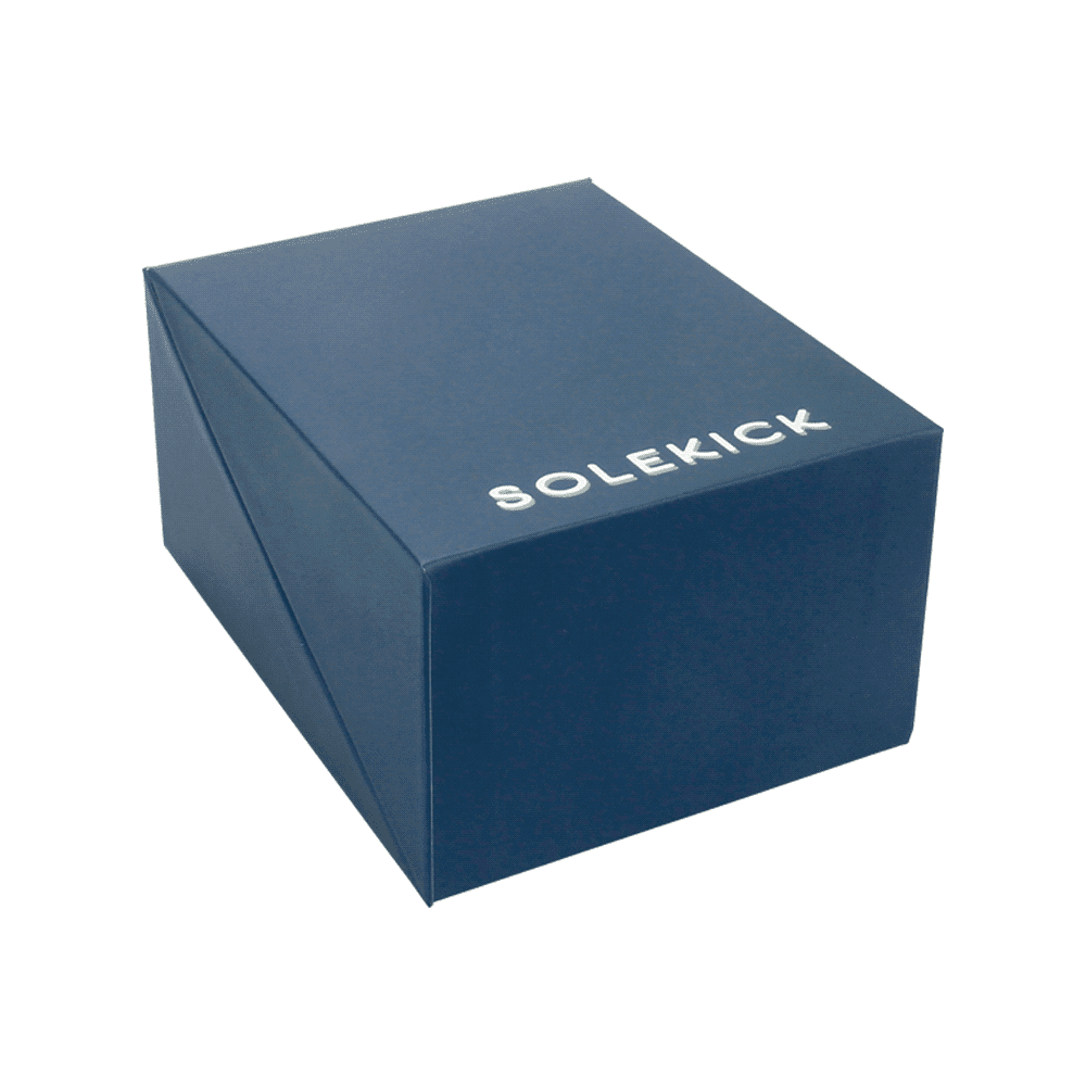 A navy blue box featuring a logo, designed for the Solekick MagClick Fast Wireless Charging Stand.